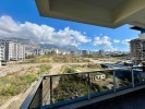 Меблированные апартаменты 1+1 в районе Махмутлар
